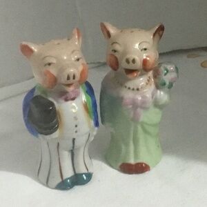 Vintage anthropomorphic bride and groom salt and pepper shakers with cork stops